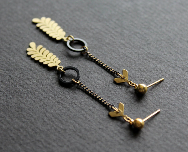 Boucles d'oreilles de style classique Pinna, offrant une élégance intemporelle pour un usage quotidien.