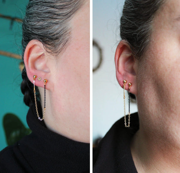 Boucles d'oreilles à double anneau Paula présentées avec élégance, idéales pour les amateurs de boucles d'oreilles pendantes.