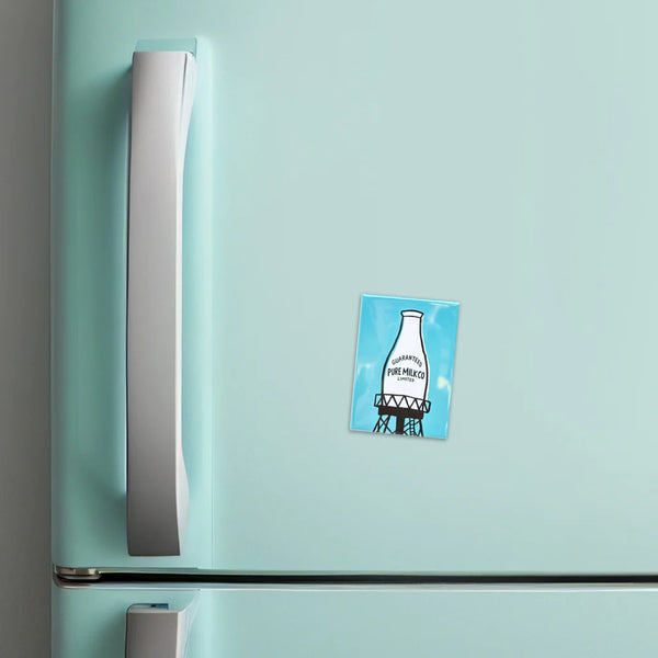Aimant rectangulaire puissant avec l'inscription 'Pur Milk', mettant en valeur ses propriétés magnétiques fortes.
